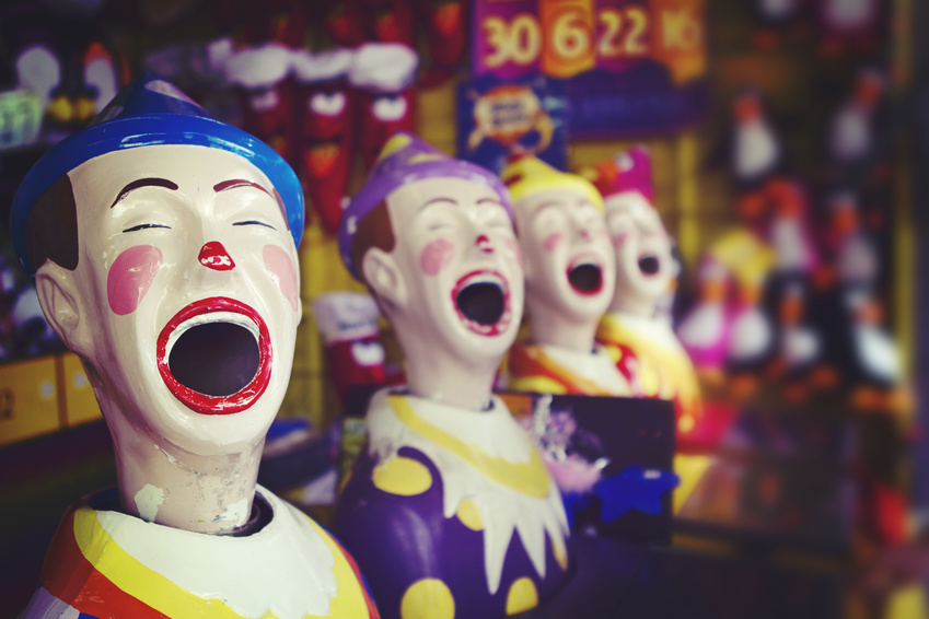 Close up of a laughing clown at the fairground